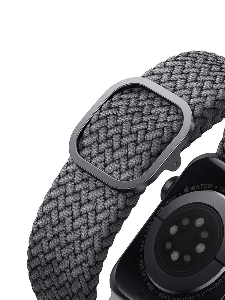 Фото Ремешок текстильный плетёный Uniq для Apple Watch 38/40/41/42, серый На фото изображено Ремешок текстильный плетёный Uniq для Apple Watch 38/40/41/42, серый